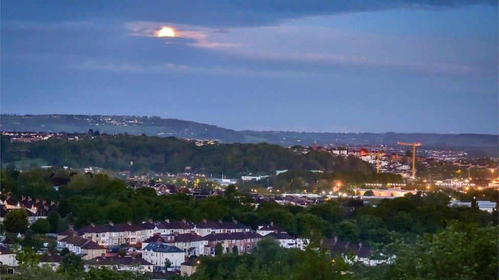 This time it's also a flower moon and a blood moon. So not only is it larger than usual it's also an unusual pinky colour as you can see here above Bristol.