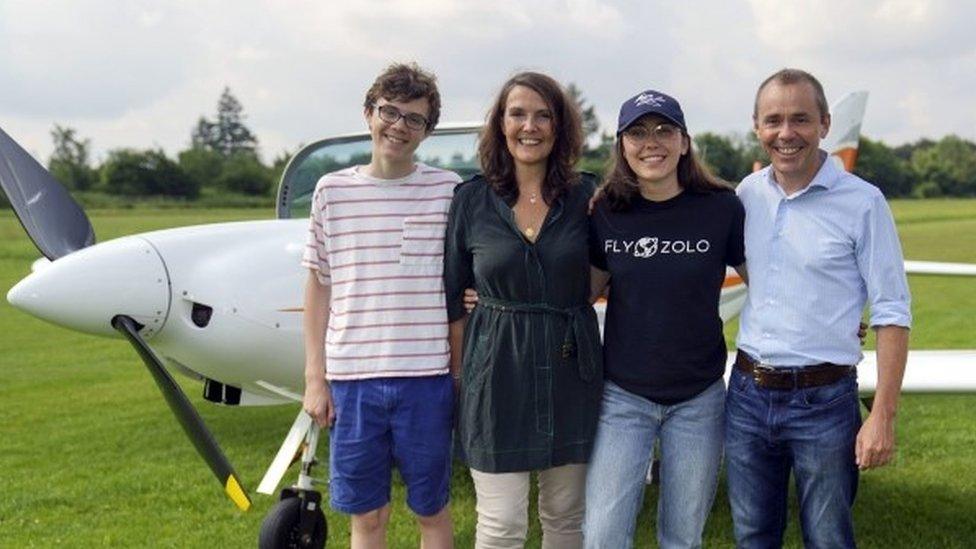 Zara Rutherford with her parents and brother