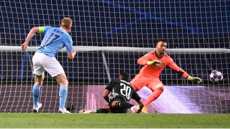 Manchester City"s Kevin De Bruyne scores their first goal