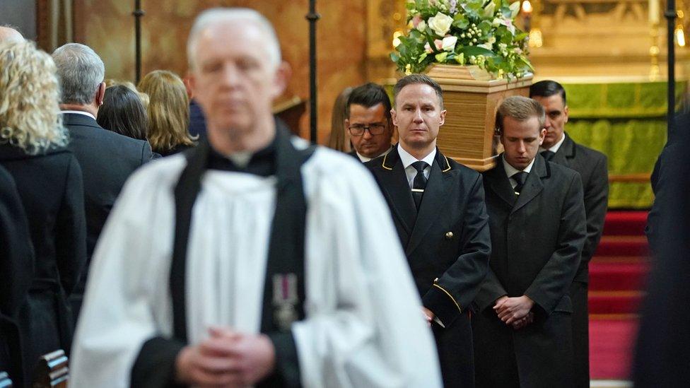 The coffin of James Brokenshire is carried from St John The Evangelist church in Bexley, south-east London,