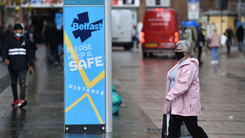 people-walking-along-highstreet-in-northern-ireland.