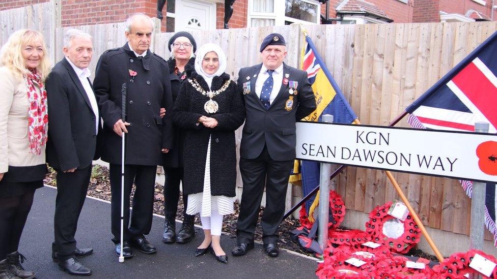 (L-R) Councillor Jan Jackson; Councillor Gerald Cooney; Councillor Adrian Pearce; Councillor Christine Beardmore; the Civic Mayor of Tameside, CouncillorTafheen Sharif; and Sean Dawson's father, Sean Dawson senior