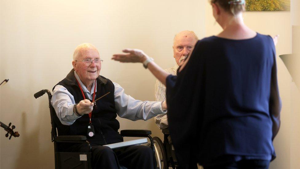 Musicians perform for residents