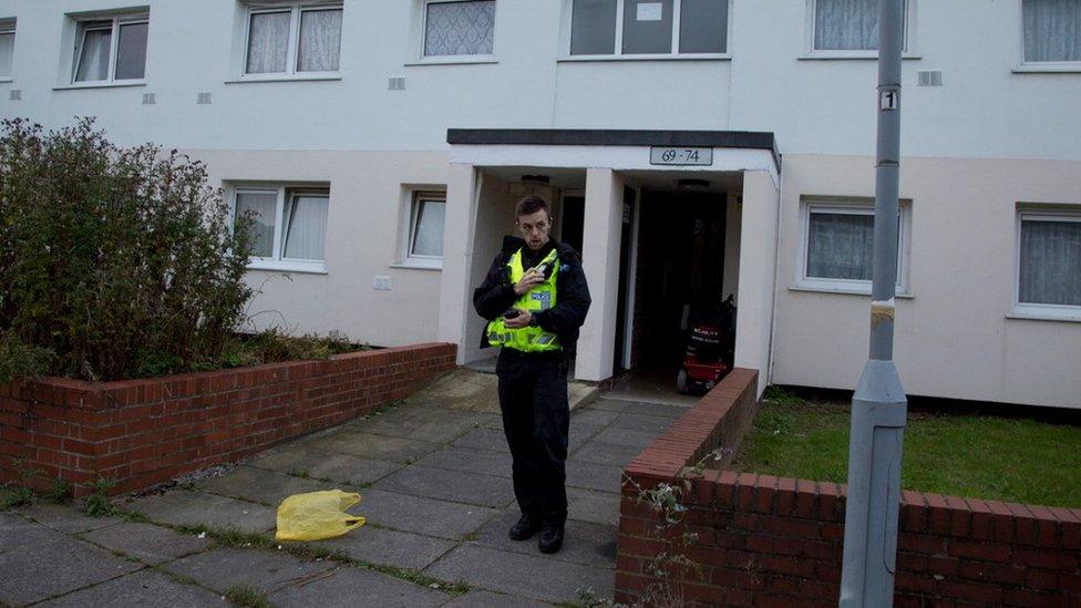 Police at the flats