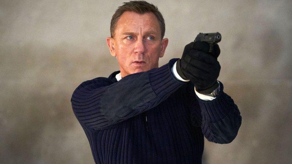 Daniel Craig as James Bond