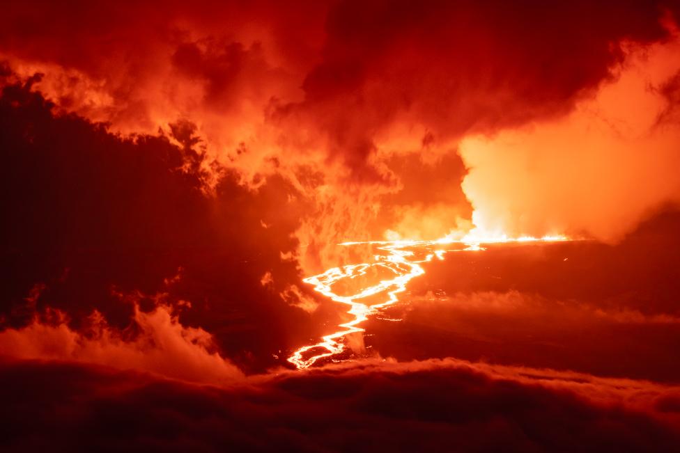 The Big Island's Mauna Loa Volcano erupts on November 28, 2022 on the Island of Hawaii. For the first time in almost 40 years, the biggest active volcano in the world erupted prompting an emergency response on the Big Island.