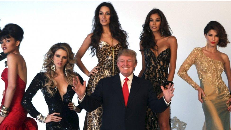 Property investor Donald Trump (C) poses with former Miss Universe Beauty Queens (L-R) Susie Castillo of the U.S., Shandi Finnessey of the U.S., Amelia Vega of the Dominican Republic, Dayana Mendoza of Venezuela, and Justine Pasek of Panama during a pageant photo shoot in New York, in a July 27, 2011 file photo.