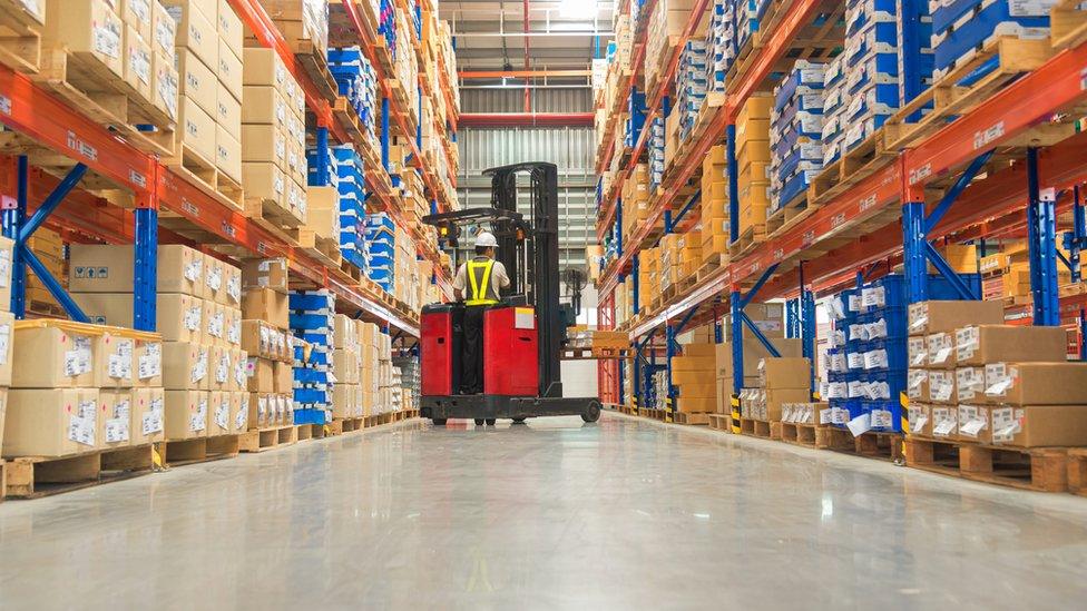 A forklift in a warehouse