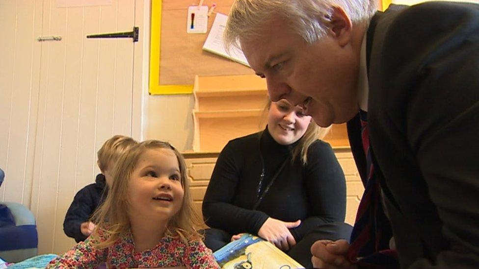 Carwyn Jones with nursery school children