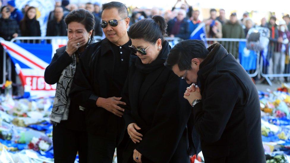 Aiyawatt Srivaddhanaprabha (far right), mother Aimon (second right), Somyot Poompanmoung, president of the Thai FA, and Potjaman Poompanmoung, the president's wife (far left)