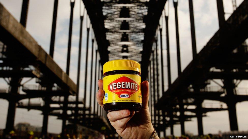 Vegemite jar held up under the Sydney Harbour Bridge Getty Images