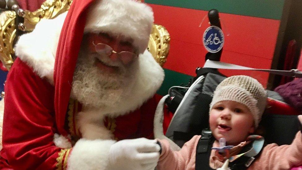 Rhea meeting Father Christmas at hospital