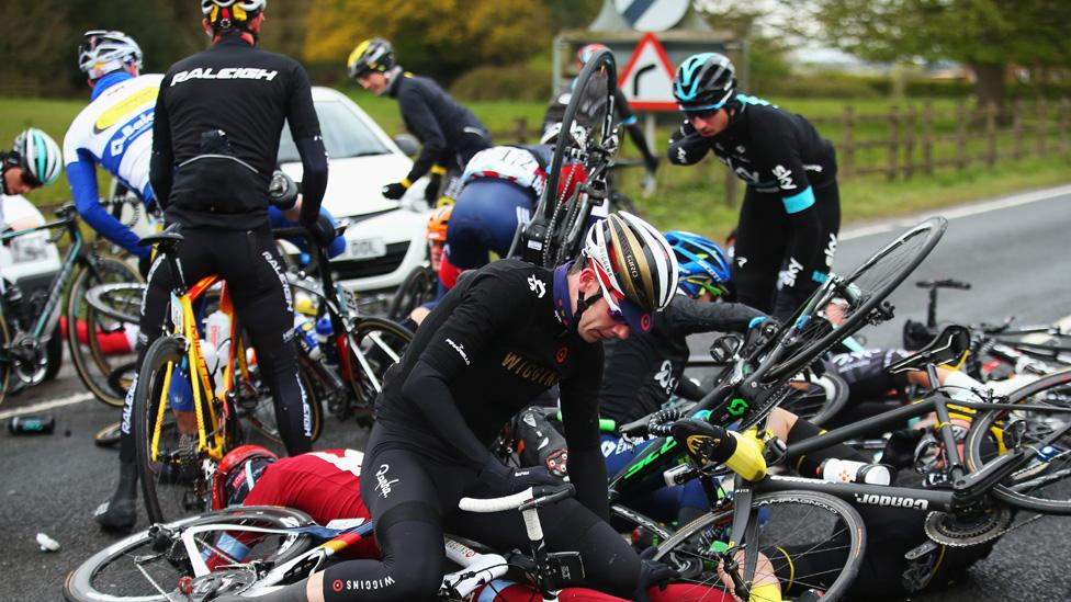 Cyclist on ground after crash