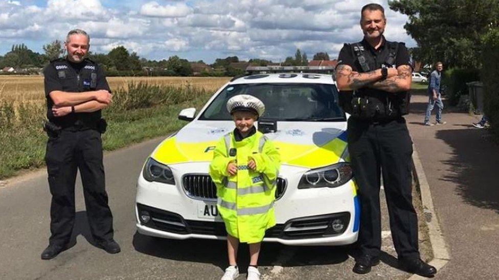 Harry Cannell with police officers