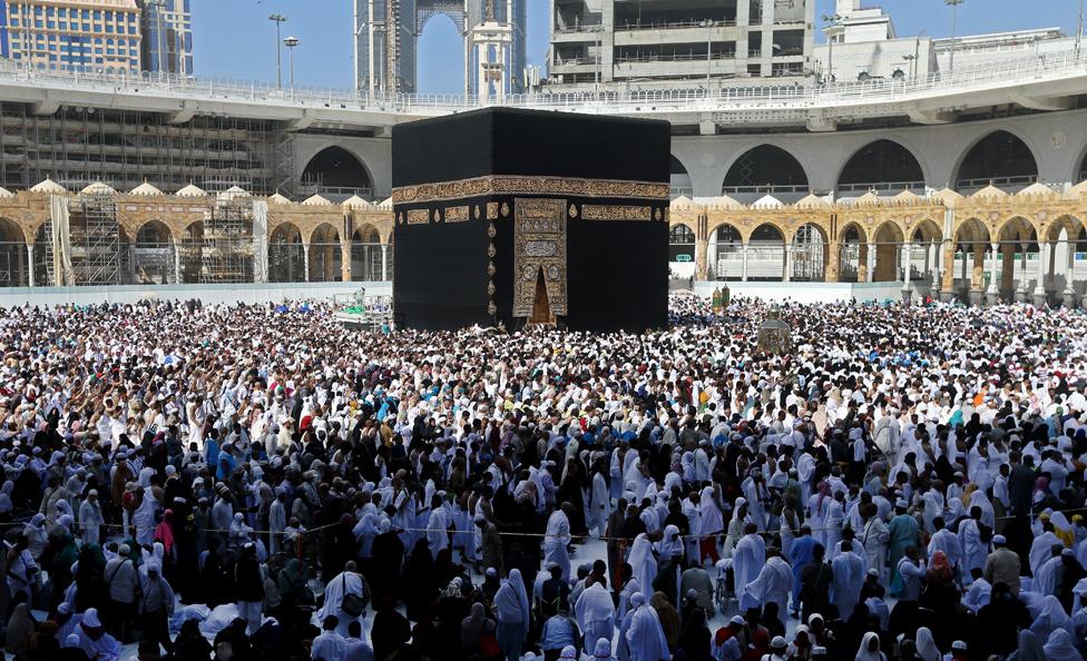 Muslim pilgrims walk around the Kaaba (Tawaf al-Wadaa), Islam's holiest shrine, at the Grand Mosque in Saudi Arabia's holy city of Mecca on 27 February 2020.