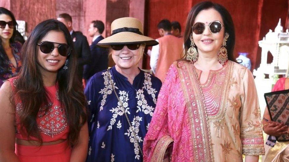 Former US Secretary of State Hillary Clinton poses with Isha Ambani (L) daughter of Mukesh Ambani, Chairman of Reliance Industries, and his wife Nita Ambani at Swadesh Bazaar, a curated showcase of traditional Indian crafts and art forms, in Udaipur, in the desert state of Rajasthan, India, December 9, 2018.