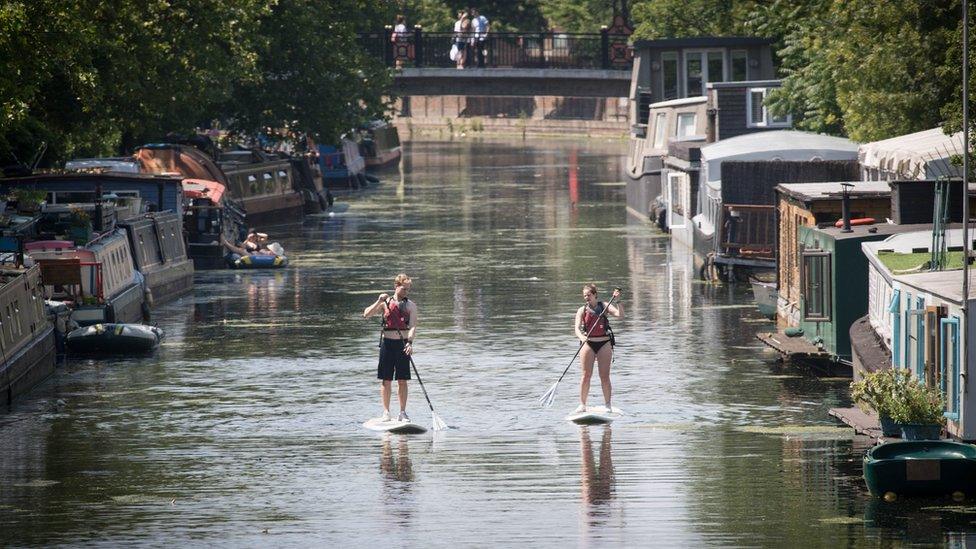 Paddleboarders on the Grand Union Canal in Little Venice, London