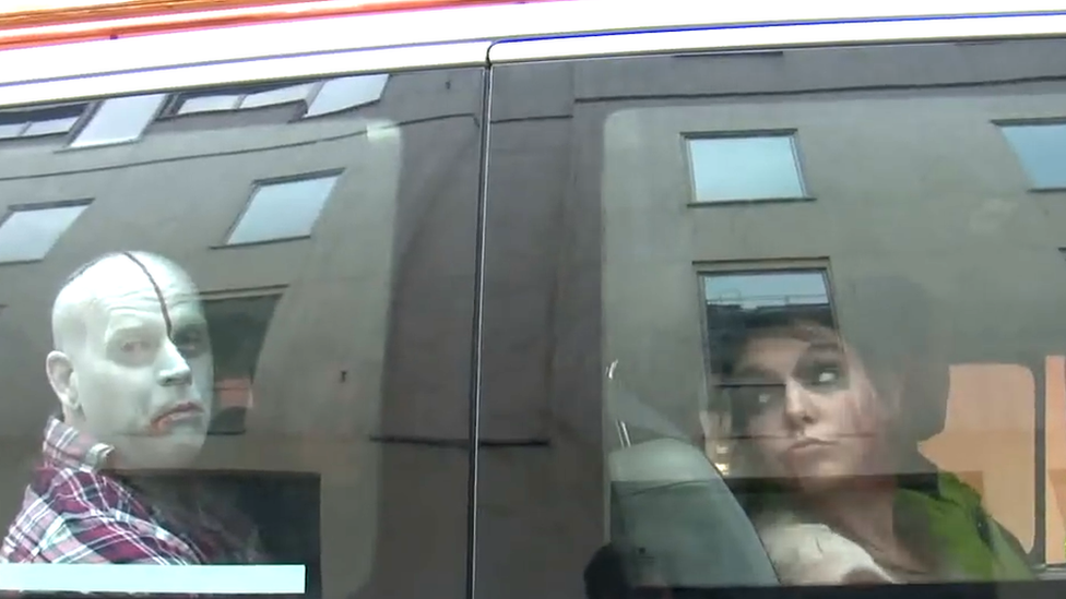 Some of the zombie protesters in a police van