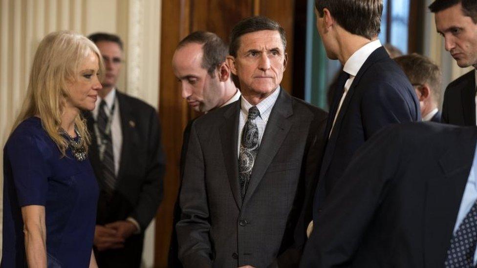 White House national security adviser Michael Flynn (C).