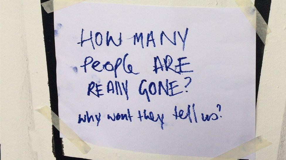 poster reading "how many people are really gone? Why won't they tell us"