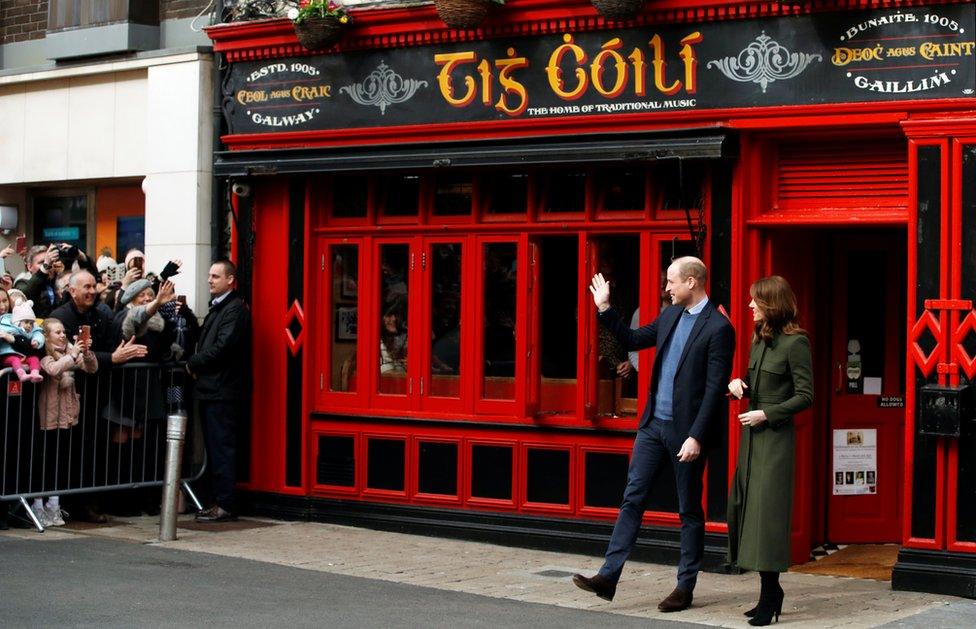 William and Kate greets people as they leave the Tig Cóilí pub in Galway