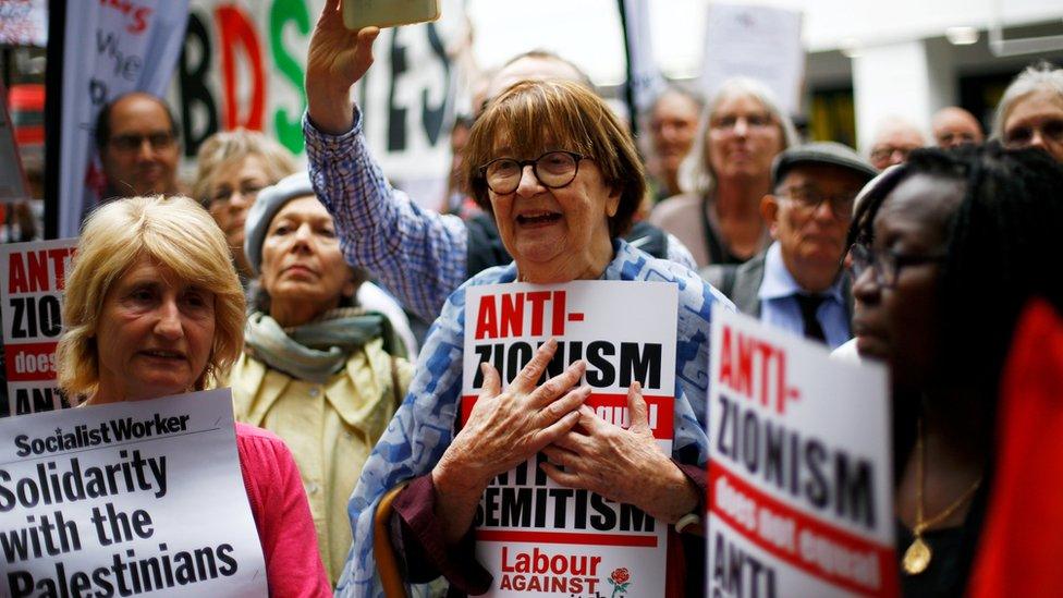 Protesters outside the NEC meeting