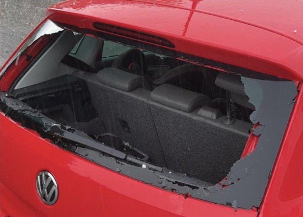 Kevin Messenger had his car window smashed in the hail storm