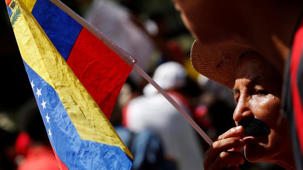 A government supporters in Caracas, 30 July