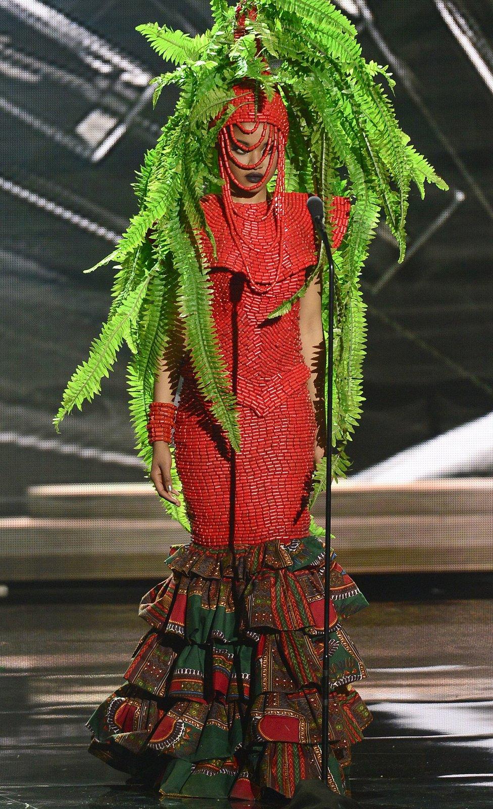 Miss Nigeria Debbie Collins wears a fern headdress as she competes in national costume contest during filming for the 2016 Miss Universe Pageant