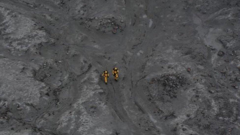 Two rescue workers on White Island