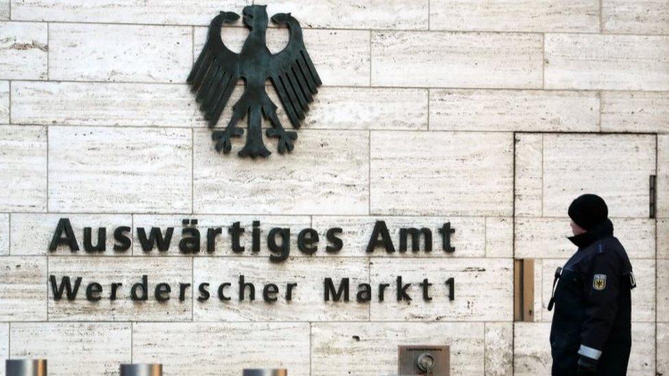 A policeman guards the entrance of the German foreign affairs building in Berlin, Germany. Photo: 28 February 2018