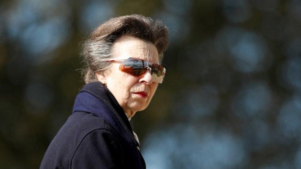 Princess Anne looks on as she visits the Royal Yacht Squadron, after Prince Philip, husband of Queen Elizabeth, died at the age of 99, in Cowes on the Isle of Wight