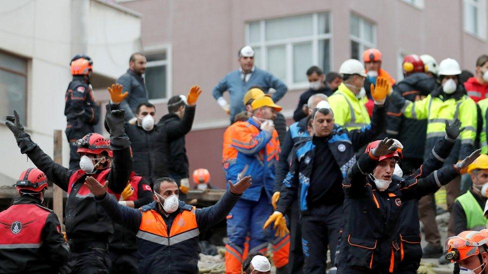 Rescue workers search for survivors at the site of a collapsed residential building in the Kartal district, Istanbul, Turkey, February 6, 2019