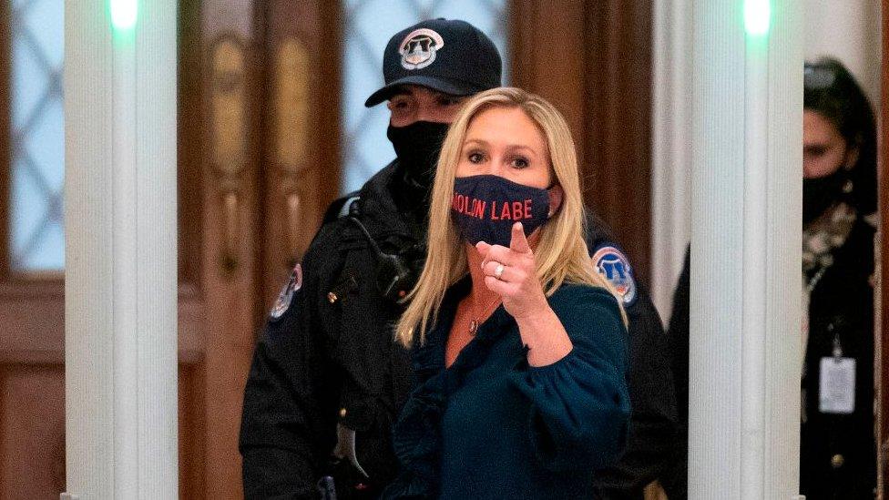 Marjorie Taylor Greene goes through security at Congress