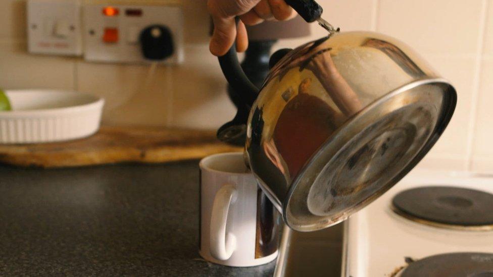 Simpa pouring a cup of tea