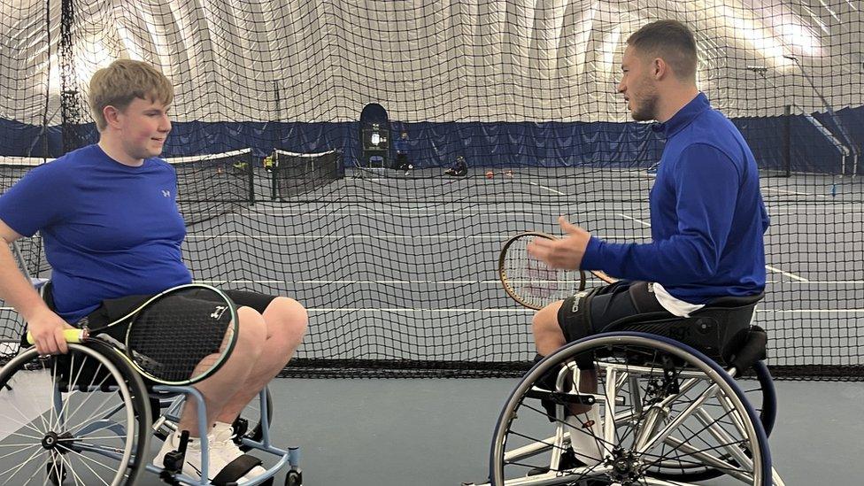 Boy tries out wheelchair tennis with Alfie Hewitt