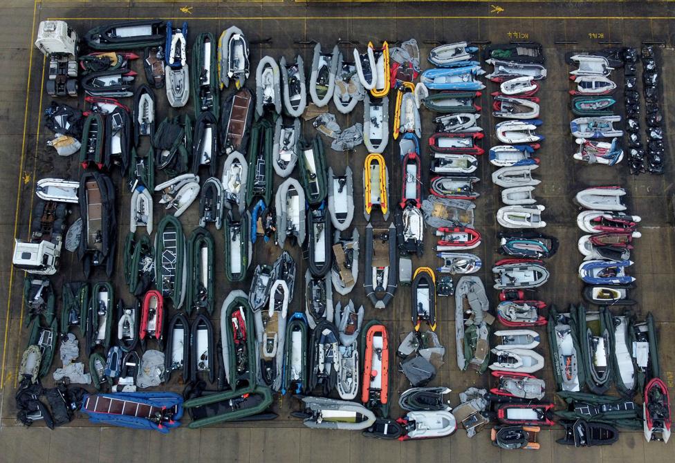 A view of one of two areas now being used at a warehouse facility in Dover, Kent, for boats used by people thought to be migrants. The boats are stored following being intercepted in The Channel by Border Force as attempts to make the crossing continue. 27 July 2021.