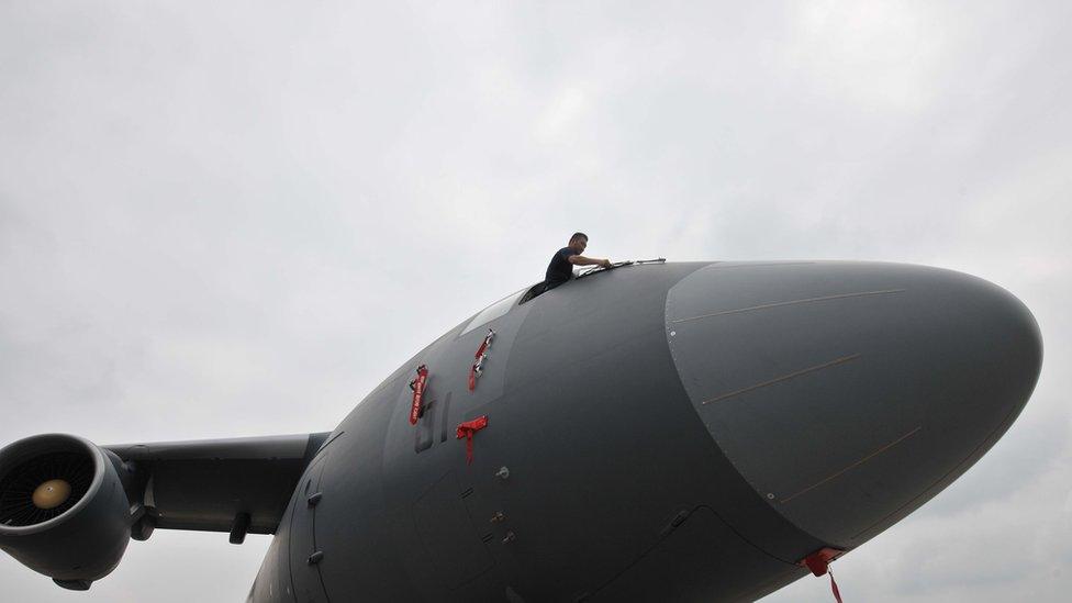 Large military transport aircraft Xian Y-20 parks at an air force base after column-mounted air force on July 7, 2016 in Chengdu, Sichuan Province of China.