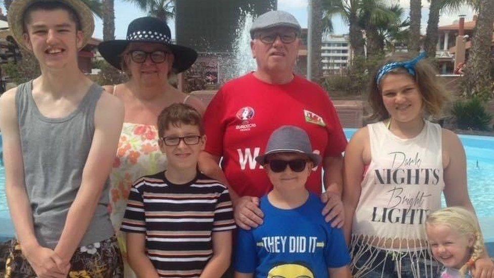 Robert Gibbon with his wife and grandchildren