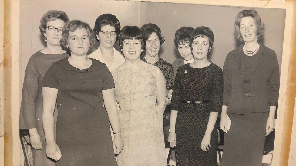 Black and white photo of eight members of the Frome Ladies Club