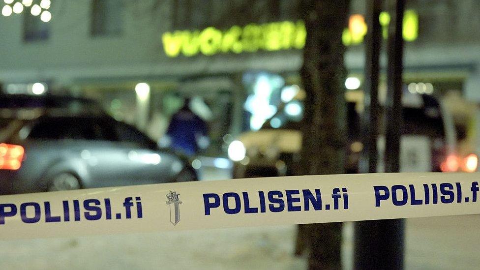 Police tape in Finland