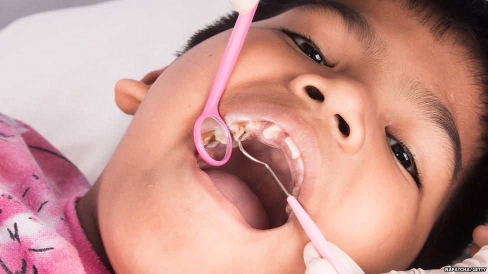 Boy having dental check-up