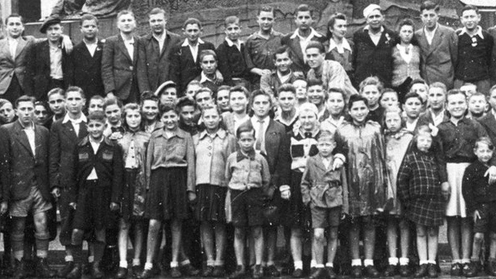 A black and white picture of a group of children in Prague before they were brought to the Lake District