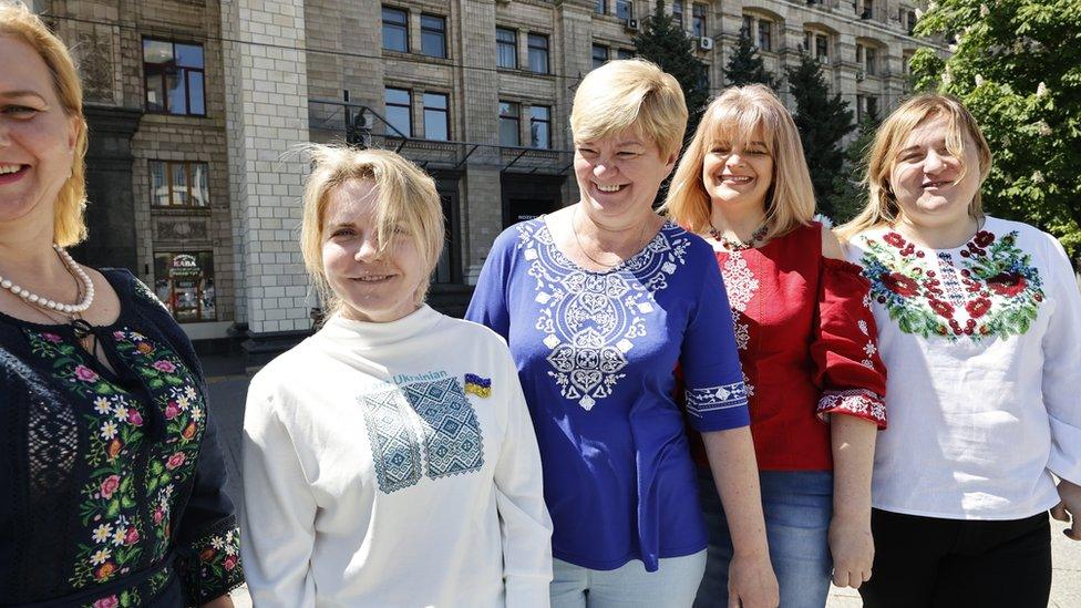 Women smiling at the camera