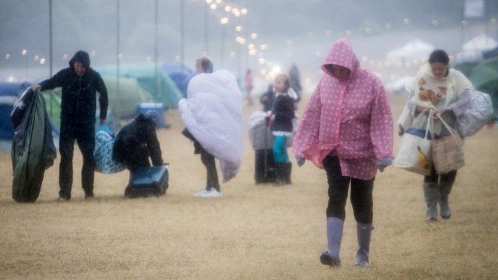 Wet festival-goers at Camp Bestival