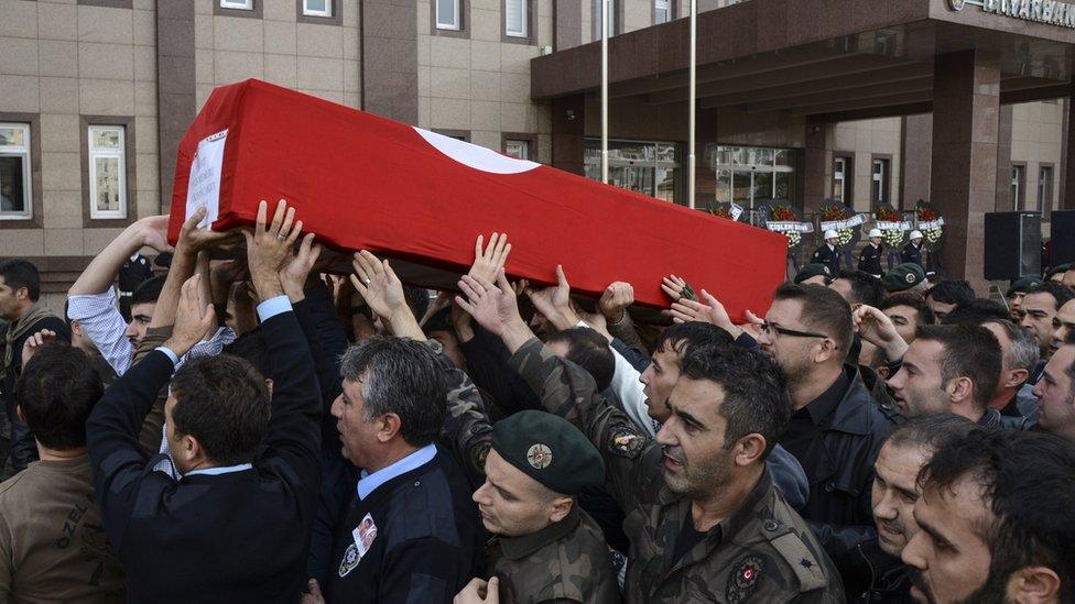 Turkish police carry coffin of comrade killed in clash with suspected IS militants, 26 Oct 15