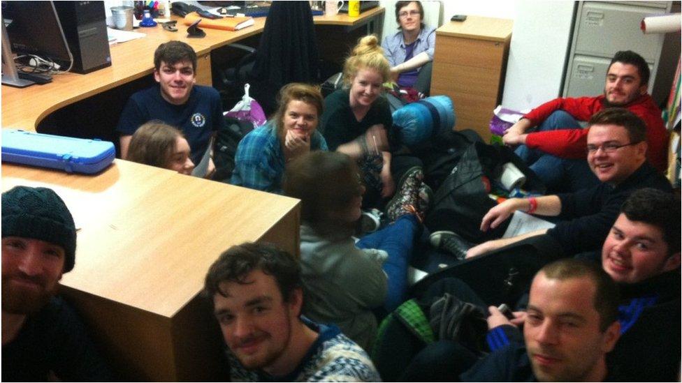 Students occupying university floor