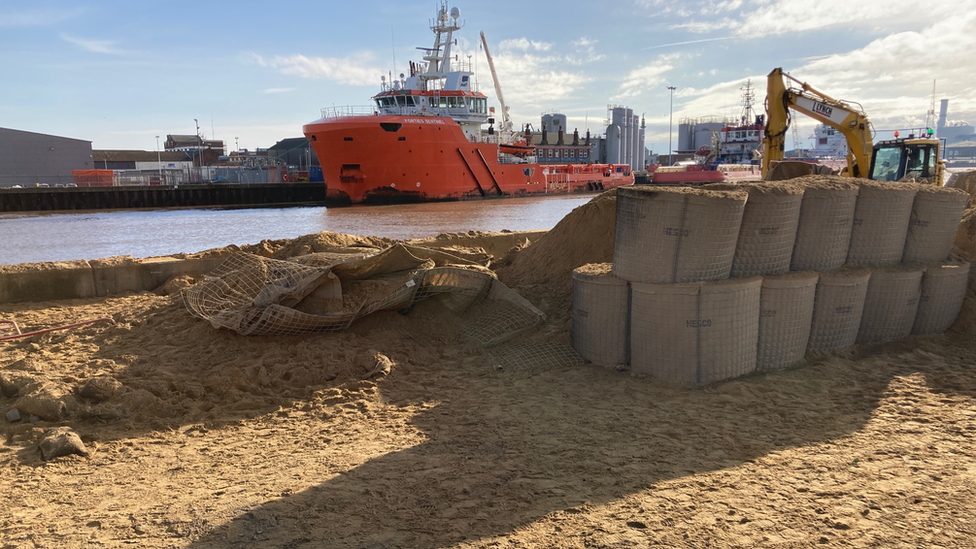 A cordon of sand bags helped reduce the impact of the bomb exploding