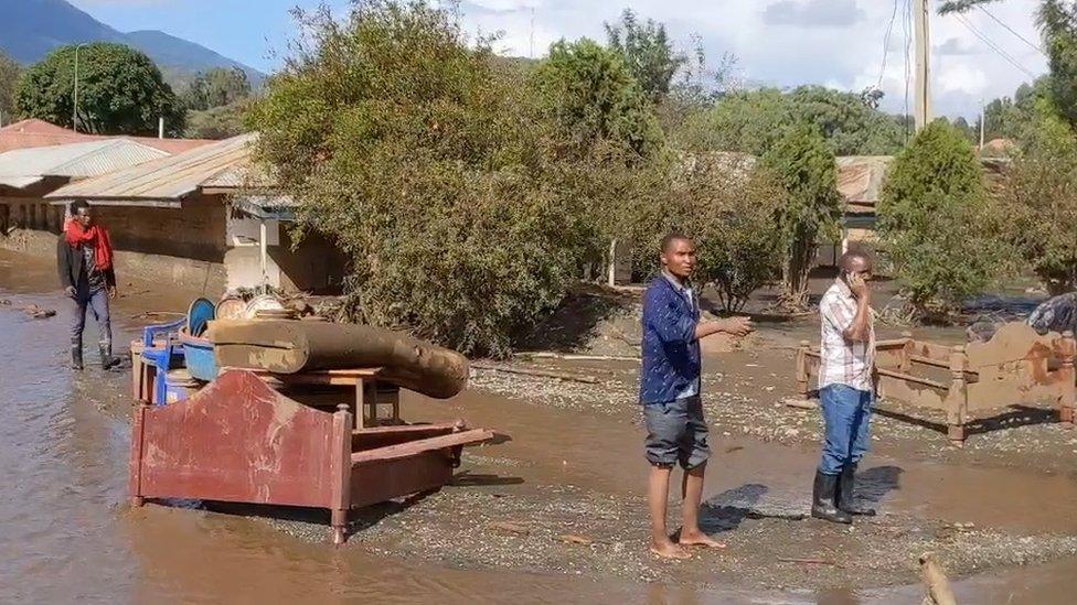 People's belongings in mud