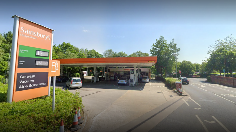 Sainsburys garage in Chippenham with some cars on the forecourt